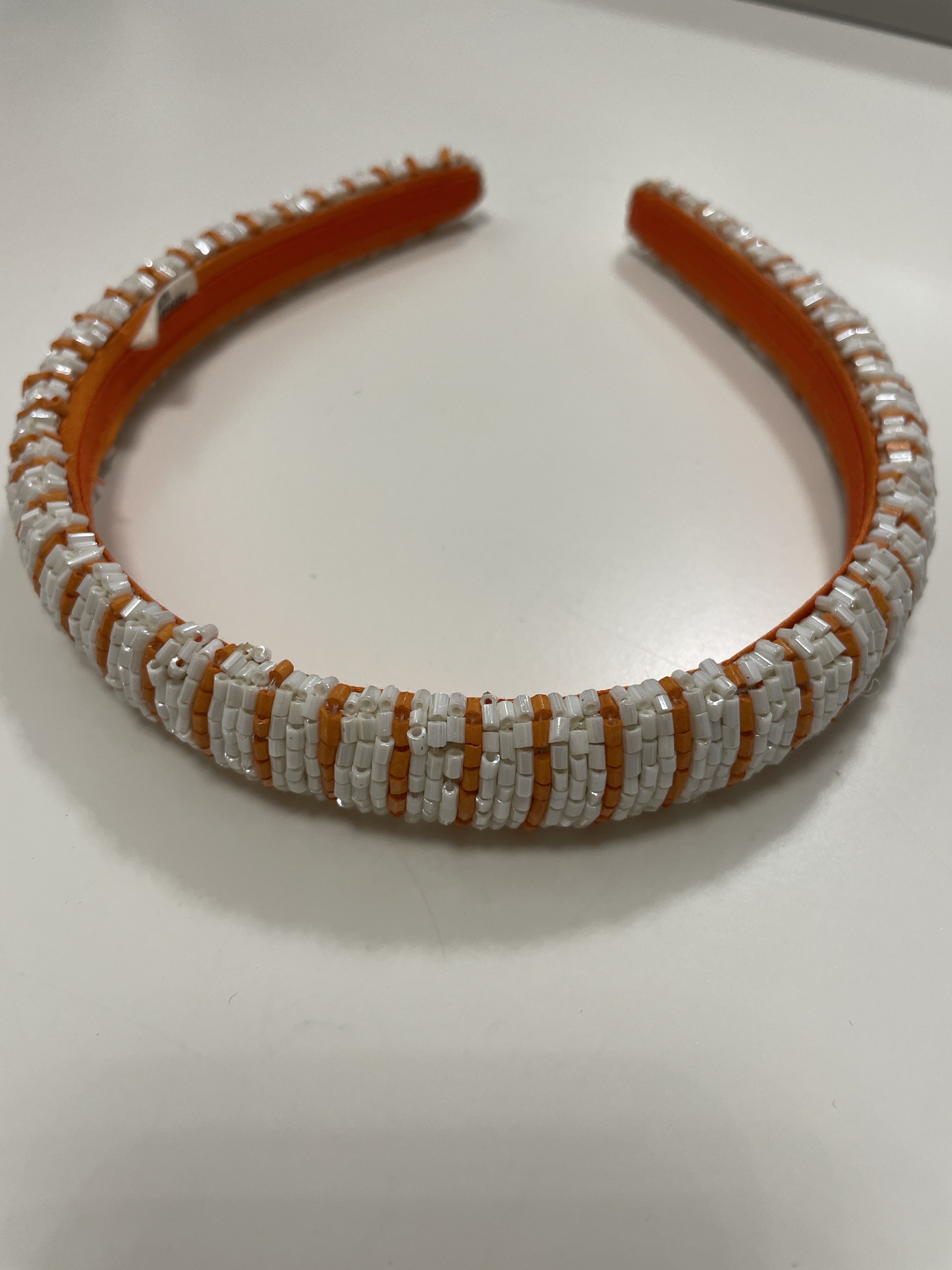 Schmaler Haarreifen mit Perlenstickerei, weiß/orange gestreift