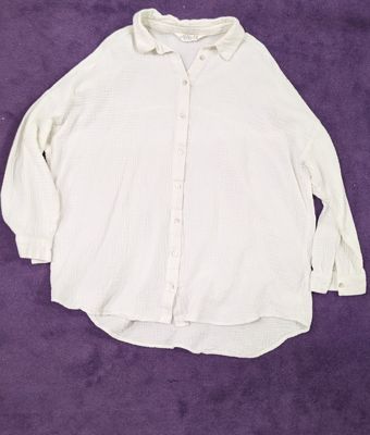 Weiße Musselinbluse